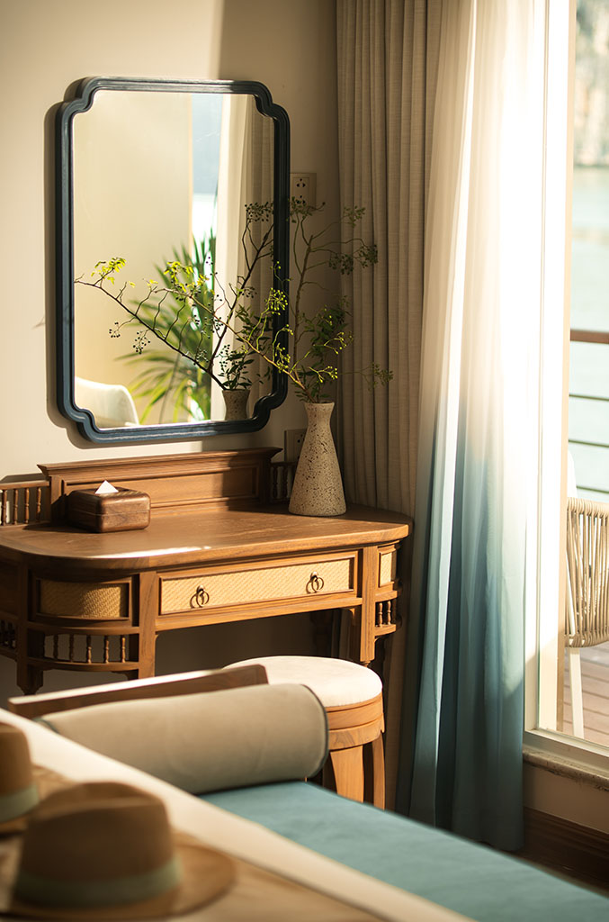 Inside a Signature Suite aboard Bhaya Soul, looking out to Ha Long Bay